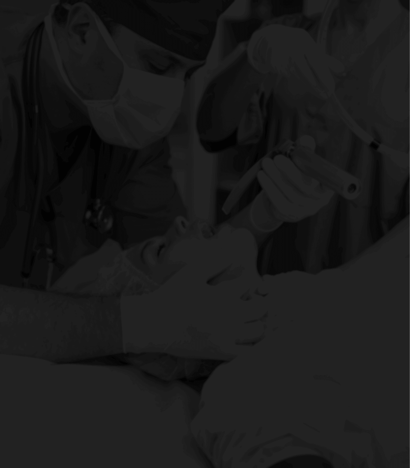 Anesthesiologist administering anesthesia to a patient