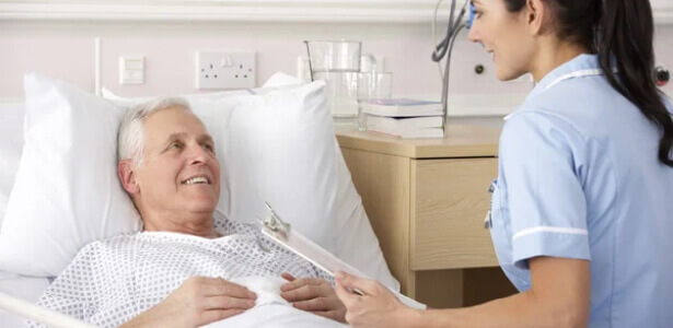 A satisfied patient lying comfortably in a hospital bed